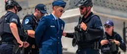 Major Watson arrested on the U.S. Capitol steps